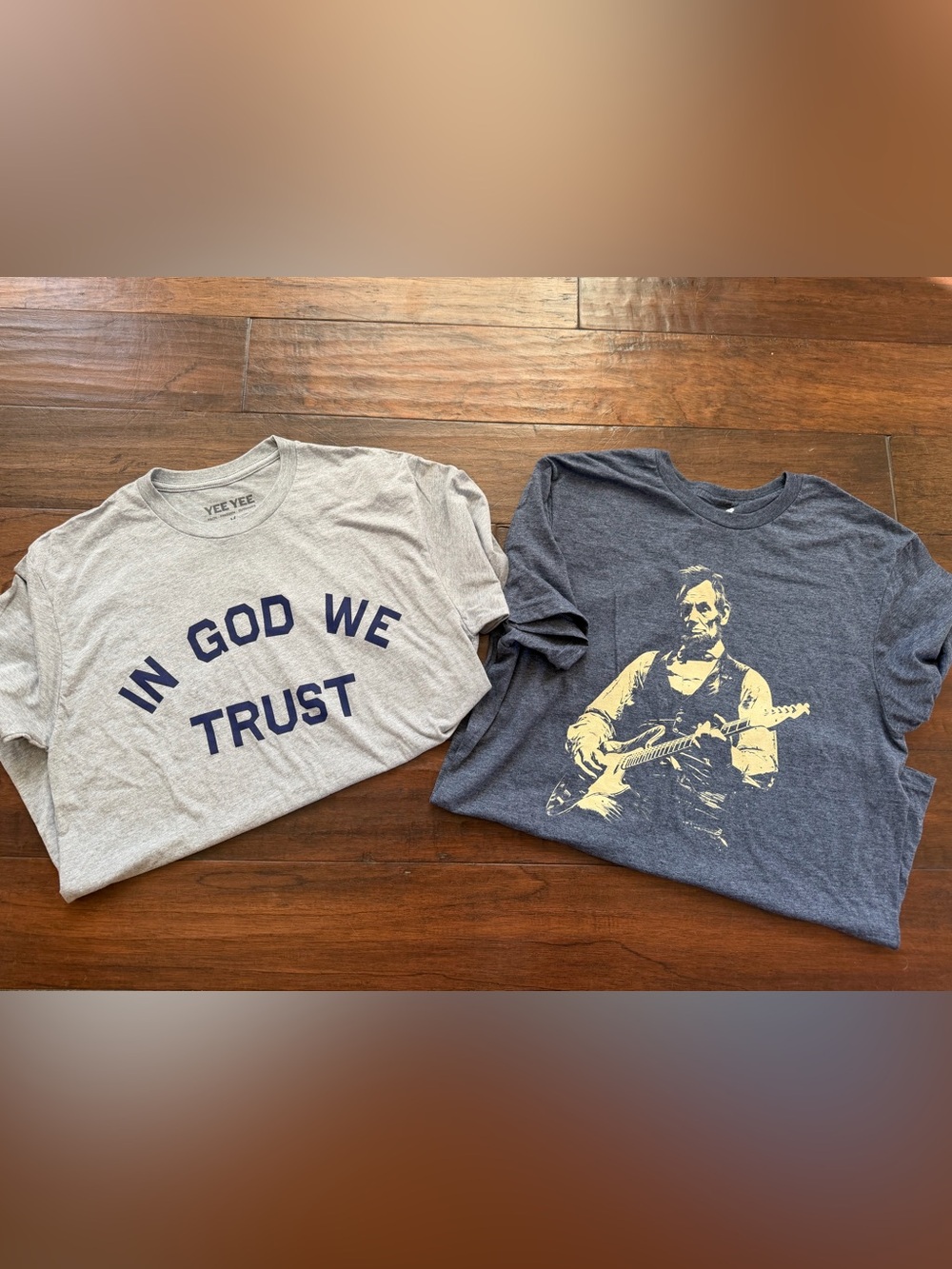 2 NEW Men’s Shirts Size M Yee Yee in God We Trust and Abraham Lincoln rock shirt